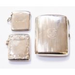 A silver cigarette case, engraved cartouche, along with two one silver one white metal vesta cases,