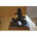 Bronze flautist on wooden base