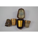 A Victorian 14ct gold and amethyst thimble, chased Greek key style border, stamped AM NM 585,