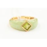 A jadeite and peridot set 14ct yellow gold ring, size N1/2, total gross weight approx 3.