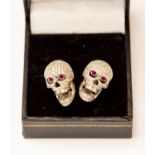 A pair of Deakin & Francis for Ralph Lauren, pave set 18ct white gold skull cufflinks,