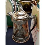 A large lidded wine/ale jug patented J.A Simpson and a mid Victorian triple plate R.