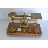 A Victorian brass set of postal weighing scales and weights