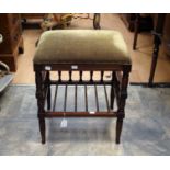 A Victorian Aesthetic mahogany piano stool woth turned gallery stretcher and green velour