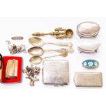 An assortment of small silver items comprising of two velvet lined dressing table boxes and two