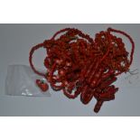 A quantity of coral type jewellery