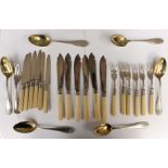 A collection of assorted fish knives and forks, mainly early 20th Century, with ivorine handles,