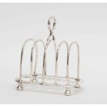 A collection of silverware, comprising a Victorian silver toast rack, London JB, 1884 s/d,