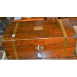 An early 20th century rosewood writing slope, bearing an inscribed plaque dated 1912,