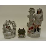 Collection of 19th Century Staffordshire figures and cottage