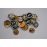 A collection of early 20th Century buttons,