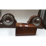 An early 20th century Walnut cased eight day mantle clock and a similar Oak cased eight day mantle