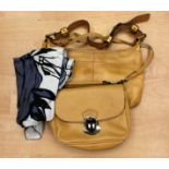 A David Jones camel coloured leather saddle bag and another camel cow hide handbag by Coach.