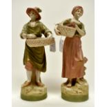 A pair of Royal Dux figurines flower and fruit sellers,