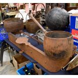 A collection of metal wares, including fender, cooking pots, tray,