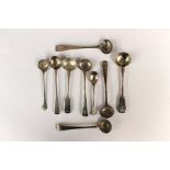 A collection of assorted silver condiment spoons, mostly George III and later, of various makers,