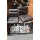 Four leatherette dining chairs