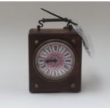 A mid 19th Century walnut cased mantle clock, brass mechanism, handle to top, enamelled dial,