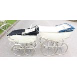 A mid 20th century Wilson pram, painted cream body, blue hood, measuring approx 141 cm length,