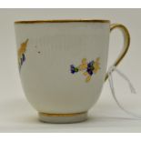 A Derby porcelain 129 pattern coffee cup, circa 1790, moulded fluting and floral sprigs, puce mark,