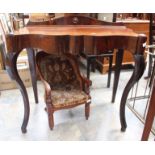 Early 20th Century mahogany occasional table with a Victorian children's chair
