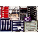 Collection of silver cased knives and forks, spoons, cocktail sticks and other silver items,