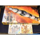 Airfix kit of Apollo Saturn V, unmade, along with two boxes of Airfix Soldiers,