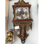 A Dutch Delft inset wall clock, mahogany cased with two weights,
