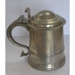A straight sided quart tankard with dome lid, low fillet on the drum,