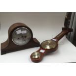 An Enfield Napoleon hat clock, mid Century along with a wall mounted barometer,
