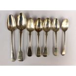 A collection of assorted silver spoons,
