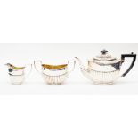 Silver three piece tea set ebony handle, marks rubbed, sugar bowl London 1896,