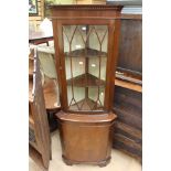 A mahogany corner display cabinet, glazed top with cupboard to base.
