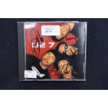 U2 - 'Summer Rain' U2 7 CD autographed/signed by all four in black sharpie on front insert