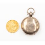 An Edward VII 1910 sovereign, London mint, together with a silver fob sovereign case,