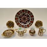 Royal Crown Derby 1128 including dinner plate, three pin dishes, small vase, cream jug,