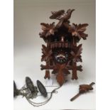 A Swiss made cuckoo clock, Loetscher, all complete,