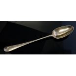 A George III Old English Pattern basting spoon, the reverse handle engraved with a crest,