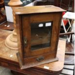 Early 20th Century Oak glazed smokers cabinet with single door 40 x 32 cm