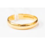 An 18ct gold wedding band size 'P' 2.
