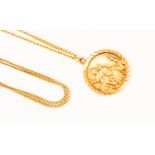 A 9ct gold St Christopher pendant on a yellow metal chain together with a 9ct gold necklace chain