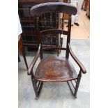 Victorian rocking chair with turned spindle back.