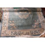 A large Chinese carpet,