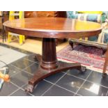 A mahogany drum top table,