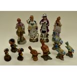 A collection of eight assorted ceramic bird figures and four figures of men and women (one Box)