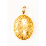 An 18ct gold oval locket with leaf and shield decoration, size approx 38mm x 30mm,