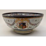 A 19th Century Chinese export armorial punch bowl, decorated with swags of flowers,