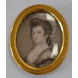A Victorian miniature female portrait, painted on ivory, gilt metal frame,