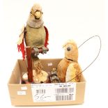 Two tinplate/fabric battery operated parrots made by Marx,