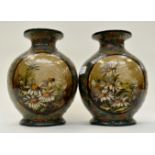 A pair of Doulton Lambeth Pottery vases, early 20th Century, hand painted with sunflowers,